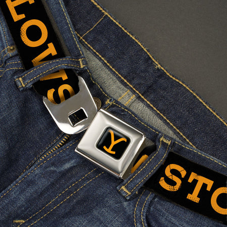 Close-up of the weathered Y logo on the belt webbing.