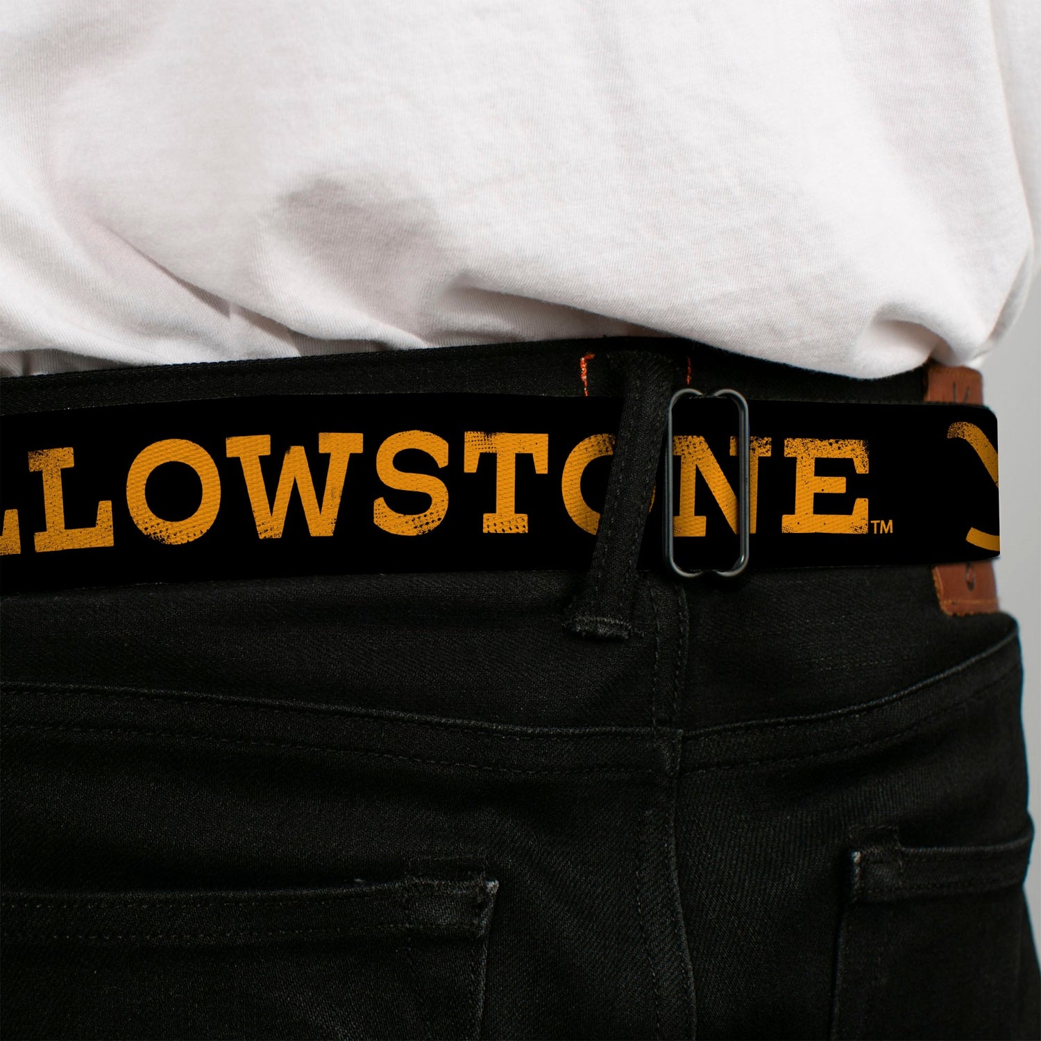 Side view of the durable black and orange polyester strap.