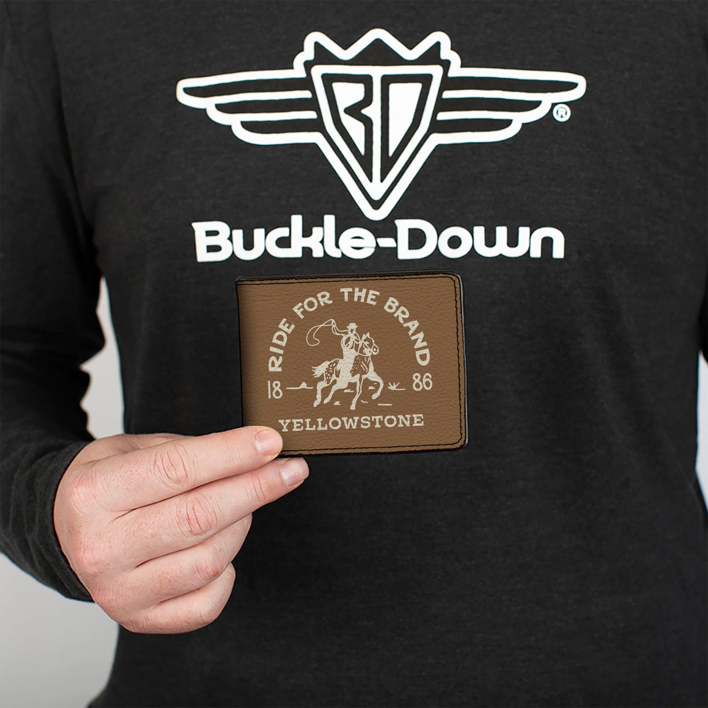 Close up of Ride for the Brand typography on brown vegan leather