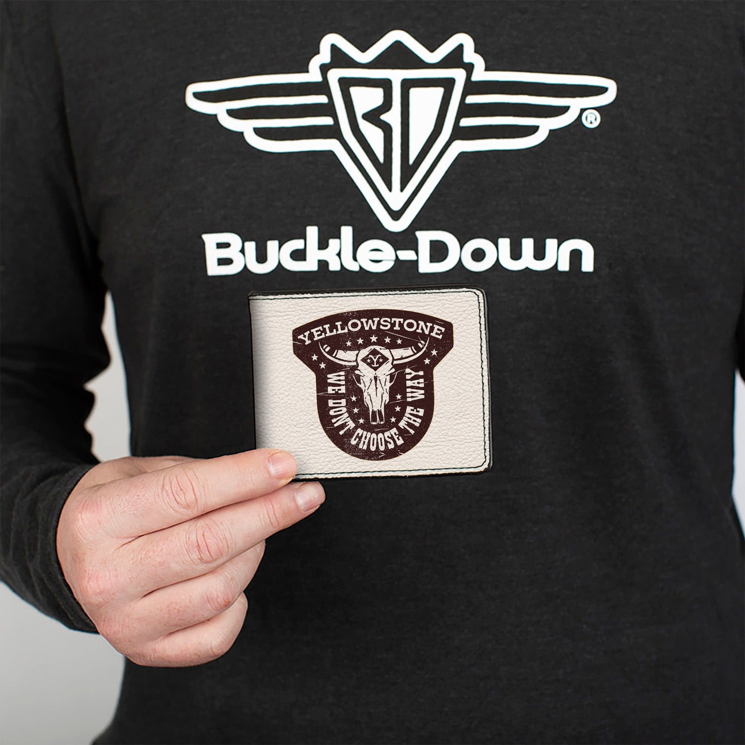 Close-up of the Yellowstone Y badge and quote on the wallet front