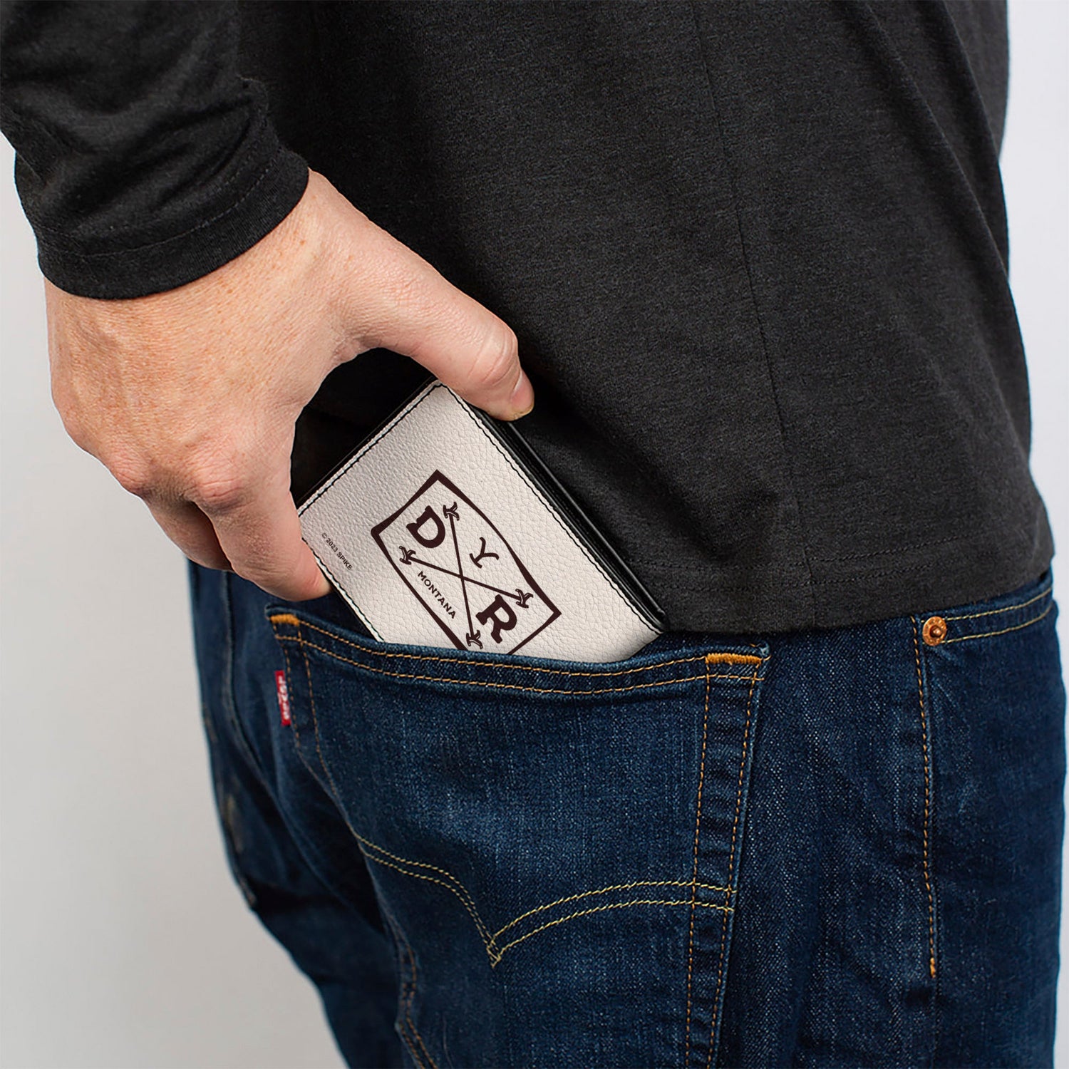 Back side view of the white vegan leather wallet with brown trim