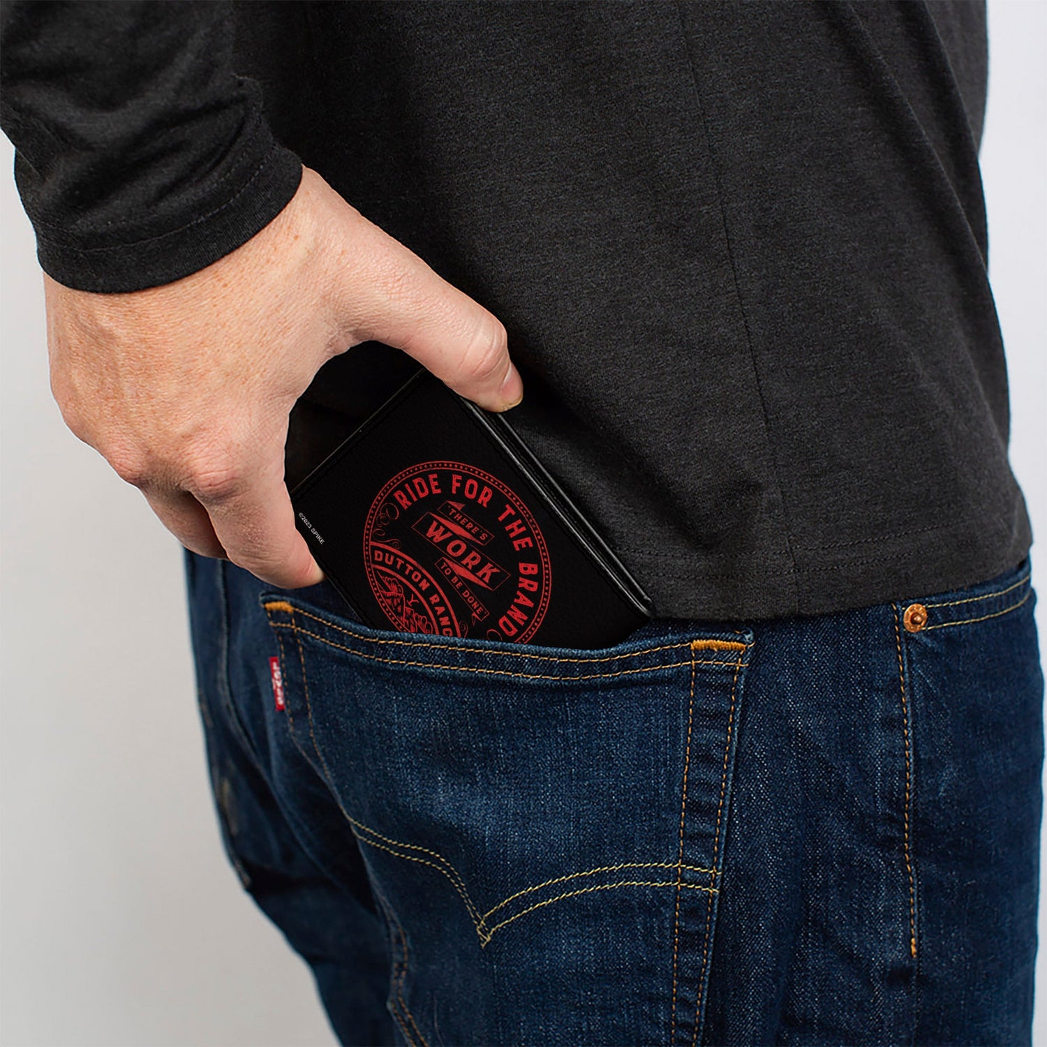 Side profile of the slim bi-fold wallet design showing thickness.