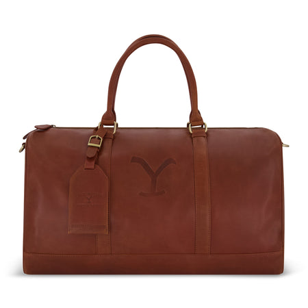 Yellowstone Real Leather Duffel Bag with gold hardware and luggage tag